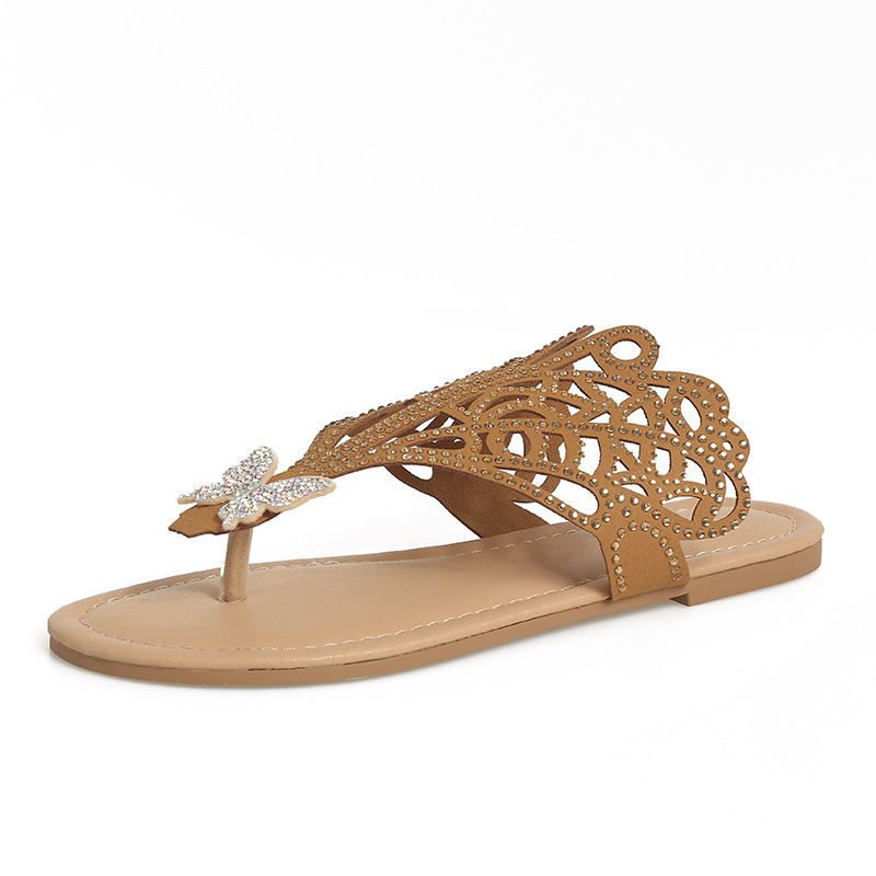 Women's slip-on flip-toe sandals by ShopByBali with rhinestones and hollow design, flat-heeled slippers for fashionable comfort.