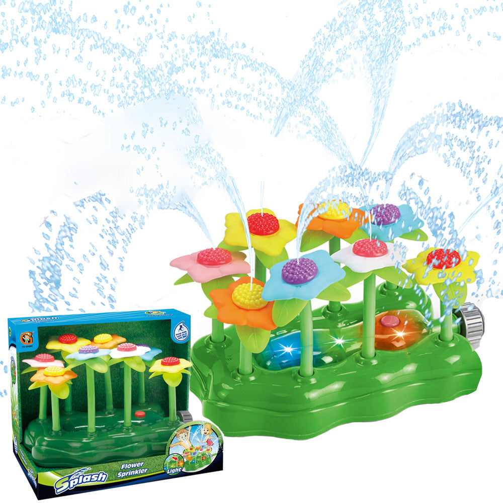 Colorful outdoor garden sprinkler toy for kids, featuring a cartoon design, used for summer water play and outdoor baby bathing fun.