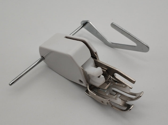 Close-up of CJdropshipping sewing machine presser foot type 0, showing the metal attachment with detailed craftsmanship.