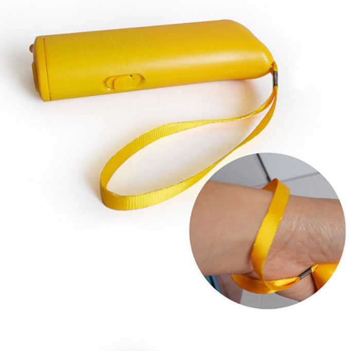 Boxed CJdropshipping ultrasonic dog trainer with flashlight, battery-free bark control device for barking dogs, compact and portable.