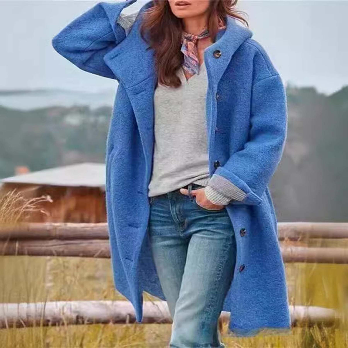 Elegant long women's woolen outwear with hood, pure color design, from CJdropshipping, styled in a European and American fashion trend.